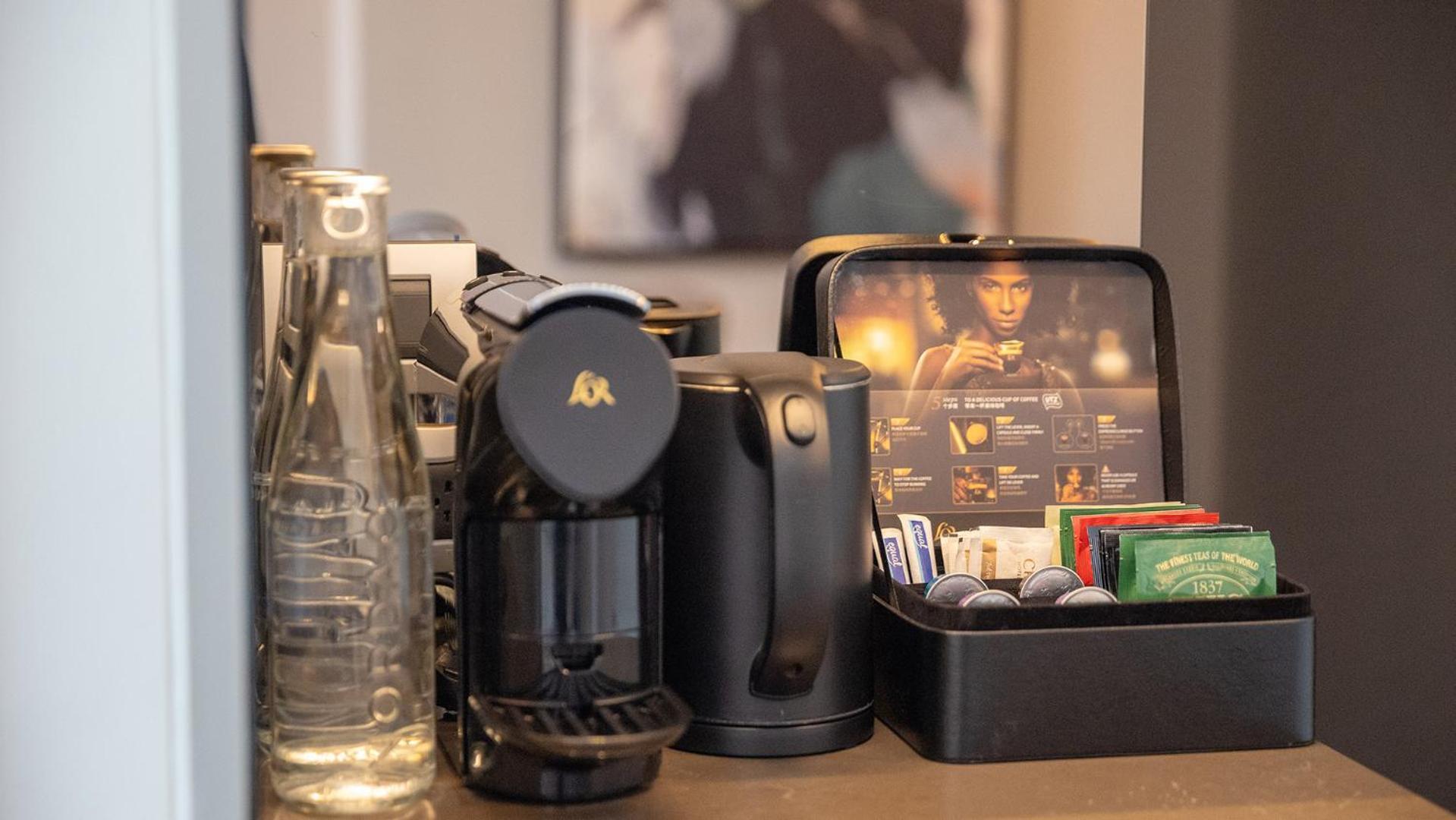 Chatrium Grand กรุงเทพมหานคร ภายนอก รูปภาพ A Nespresso coffee machine